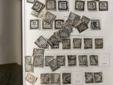 a book with a bunch of stamps on top of it