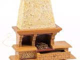 a stone fireplace with logs in front of it