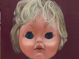 a painting of a woman with blonde hair and blue eyes