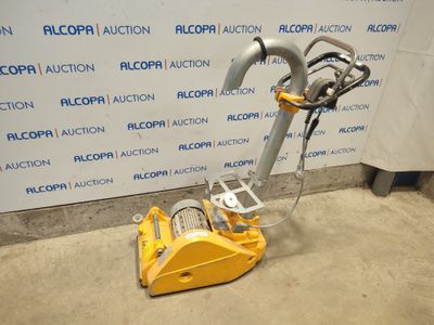 l'image d'une machine posée sur le sol