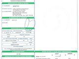 a close up of a document with a barcode on it