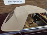 a car that has a cover on the top of it