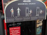 a vending machine with a sign on the front of it