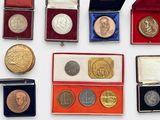 many different types of coins in a box
