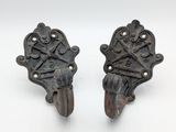 pair of antique cast iron door handles with ornate design