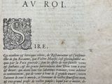 a black and white image of an old book with writing on it