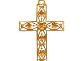 pendentif en forme de croix en or sur un cordon noir, sur fond blanc