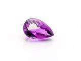 a purple amethorate gems on a white background