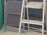 a ladder that is leaning up against a wall