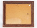 an old picture frame with a picture of a cat on it