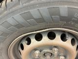 a close up of a tire that has holes in it