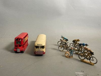 three toy vehicles that are sitting next to each other