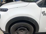 a white van that has a sticker on the side of it