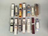 a lot of watches that are sitting on a table