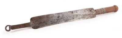 a knife that is laying on a white surface