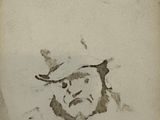 a drawing of a man with a hat on a piece of paper
