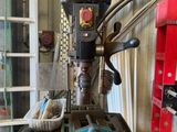 a machine that is sitting on a table in a garage