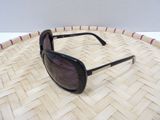a close up of a pair of sunglasses on a basket