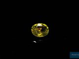 a yellow diamond on a black background