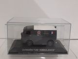 a small black truck in a clear box
