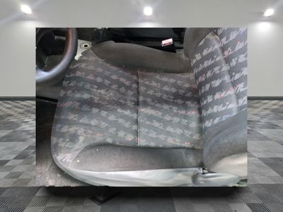 a picture of a car seat with a checkered floor