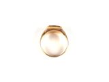 an image of a gold ring with a white pearl in it