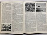 an open book with pictures of military men on it