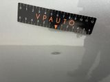 a picture of a sticker with the word vauto on it