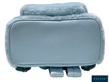 a blue bag with a blanket on top of it