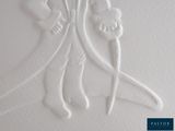 a picture of a carving of a man and a woman on a boat
