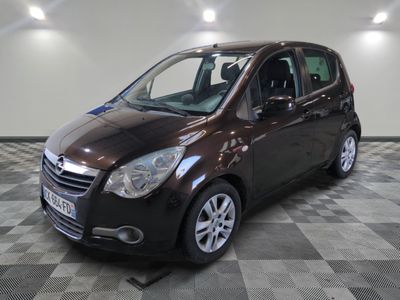 a picture of a brown car parked in a garage