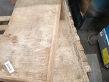 several pieces of wood are stacked on top of each other