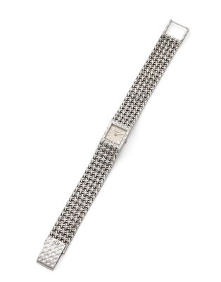 a silver watch on a white background with a white background