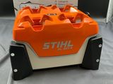 a close up of a box of stihl air tools on a table