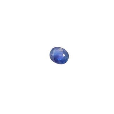 a blue sapphire stone on a white background