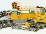 a toy train set that is sitting on the tracks