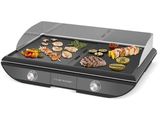 an image of a grill with various types of food on it