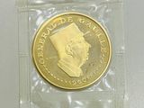 une pièce d'or à l'effigie d'un homme portant un turban