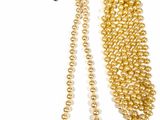 gold pearl necklace and bracelet set on a white background