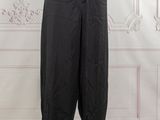 a mannequin mannequin wearing black pants on a mannequin mannequin mannequin mannequin mannequin mannequin manne