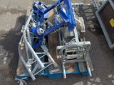 a blue machine that is sitting on the ground