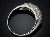 a close up of a silver ring with diamonds on a black background