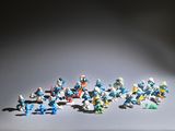 a group of small figurines that are on a table