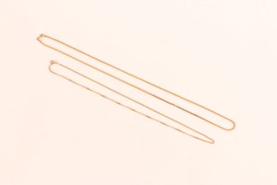 Deux chaines en or jaune 750 ‰ comprenant une chaine à maill… - Photo 1