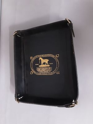 ADNET Jacques (attribué) : porte-courrier en cuir et laiton …