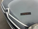 a close up of a car with a sticker on it