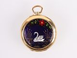 an image of a gold locke with a white swan on it