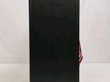 a black desktop computer sitting on a white surface