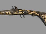 an old gun with a wooden handle and brass decorations on it
