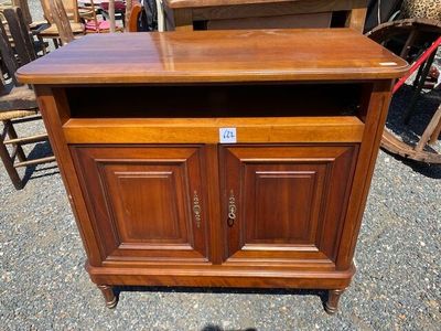 an image of a wooden cabinet with doors and drawers